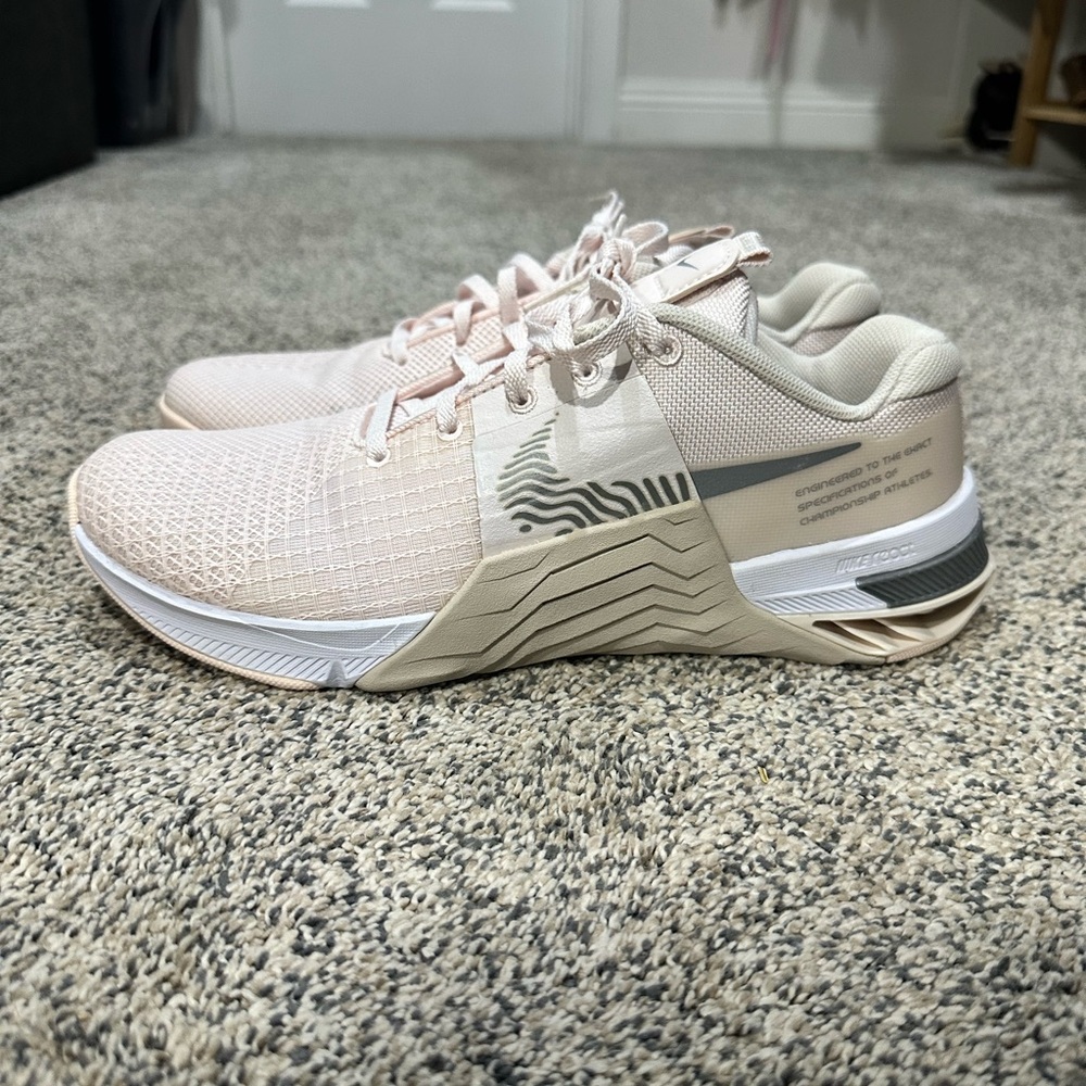 Nike Metcon 8, size 9 women's workout shoe in the Barely Rose colorway.